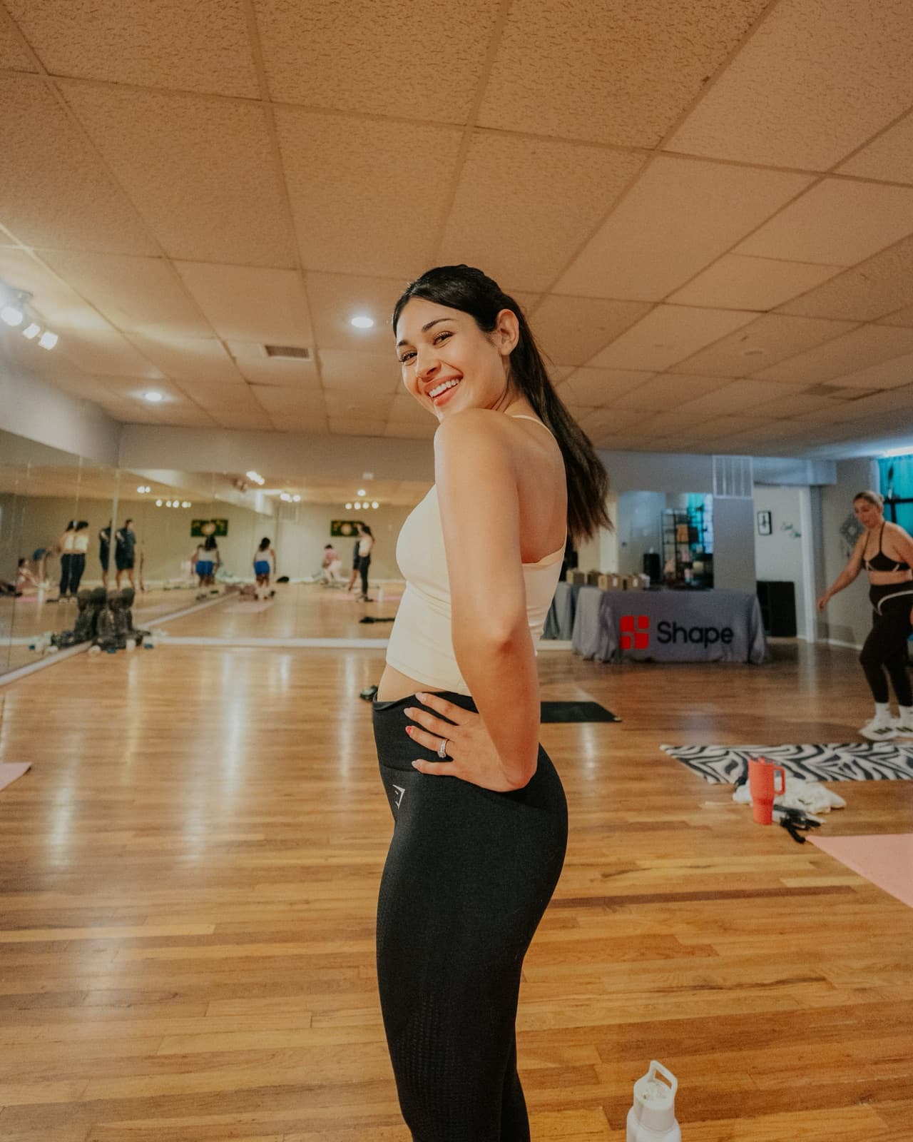 A Shape Health member smiling at a community class
